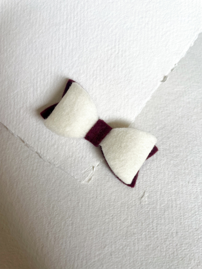 Haarstrik bordeaux/wit